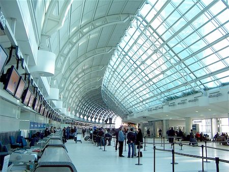 Interior of modern airport Foto de stock - Super Valor sin royalties y Suscripción, Código: 400-03936776