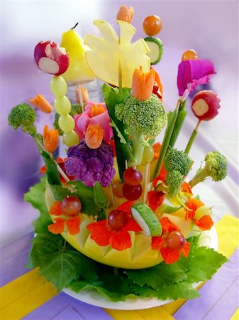 simsearch:622-06964418,k - Beautiful arrangement of food and flowers Photographie de stock - Aubaine LD & Abonnement, Code: 400-03936863