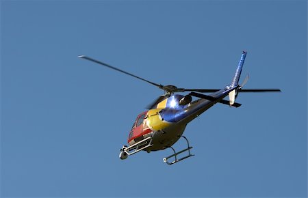 A TV news helicopter with a camera. A motion blur on rotor blades Stock Photo - Budget Royalty-Free & Subscription, Code: 400-03938253