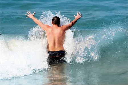 simsearch:6109-06195368,k - man in the ocean Stock Photo - Budget Royalty-Free & Subscription, Code: 400-03938262