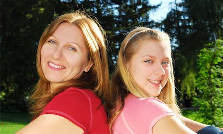 simsearch:400-04612785,k - Portrait of smiling mother and daughter in summer park Stock Photo - Budget Royalty-Free & Subscription, Code: 400-03938378