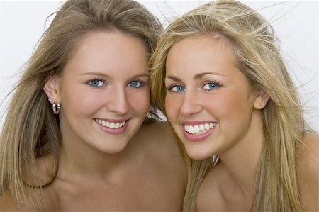 simsearch:400-03920671,k - Two beautiful young women with stunning blue eyes and toothy smiles Stock Photo - Budget Royalty-Free & Subscription, Code: 400-03938726