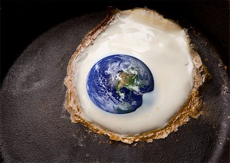 simsearch:700-03451646,k - Global warming concept image with the world being fried in a frying pan like an egg. Photographie de stock - Aubaine LD & Abonnement, Code: 400-03938797