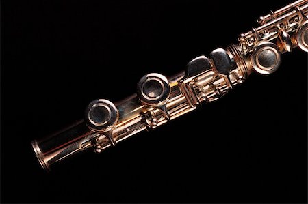 simsearch:400-03958037,k - Detail of a Western concert flute, black background Foto de stock - Super Valor sin royalties y Suscripción, Código: 400-03939050