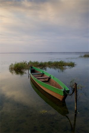 Boat at Nero lake at twilight Stock Photo - Budget Royalty-Free & Subscription, Code: 400-03939192