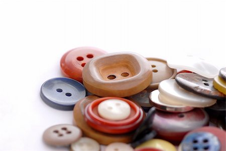 simsearch:614-08869875,k - colored sewing buttons on a white background Stock Photo - Budget Royalty-Free & Subscription, Code: 400-03939217