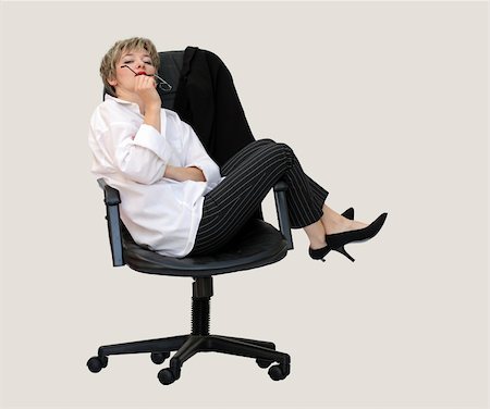 Businesswoman contemplating in her office chair Stock Photo - Budget Royalty-Free & Subscription, Code: 400-03939545