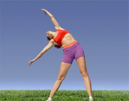 simsearch:400-04461812,k - Girl exercising outdoors on the grass Stock Photo - Budget Royalty-Free & Subscription, Code: 400-03939542