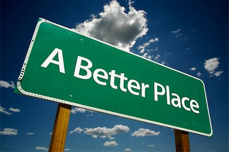 simsearch:400-04691775,k - "A Better Place" Road Sign with dramatic blue sky and clouds. Stockbilder - Microstock & Abonnement, Bildnummer: 400-03939719