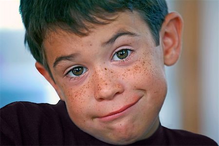 Up Close of Little Boy Making a Face Stockbilder - Microstock & Abonnement, Bildnummer: 400-03930106