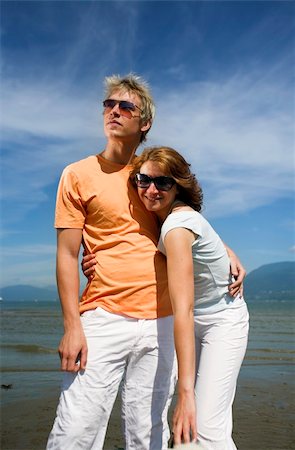 young couple posing on the beach in vancouver Stock Photo - Budget Royalty-Free & Subscription, Code: 400-03930388