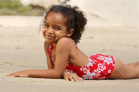 Cute little girl on a beach Stock Photo - Budget Royalty-Free & Subscription, Code: 400-03930457