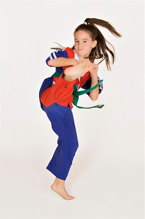 Seven year old practicing Martial Arts Stock Photo - Budget Royalty-Free & Subscription, Code: 400-03930553