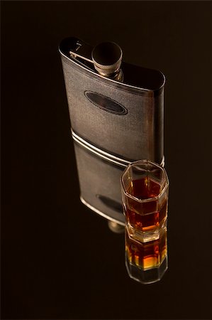 Silver flask and glass with whisky Stock Photo - Budget Royalty-Free & Subscription, Code: 400-03930840