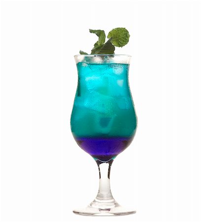 Colorful alcoholic cocktail in a glass against white background Stock Photo - Budget Royalty-Free & Subscription, Code: 400-03931380