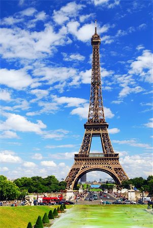 Eiffel tower on background of blue sky in Paris, France. Fotografie stock - Microstock e Abbonamento, Codice: 400-03931555