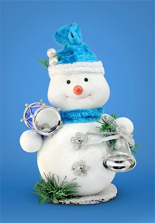 happy christmas snowman toy with drum and bell Foto de stock - Super Valor sin royalties y Suscripción, Código: 400-03932413