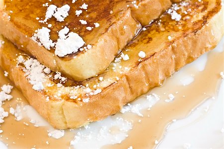 simsearch:614-03903059,k - french toast on a white plate with powdered sugar and maple syrup Stock Photo - Budget Royalty-Free & Subscription, Code: 400-03932507