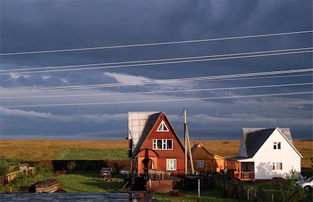 flyfishka (artist) - Country cottage at a dawn with a line of external wires Stockbilder - Microstock & Abonnement, Bildnummer: 400-03932679