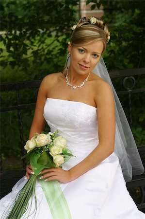 Portrait of the beautiful bride with a bouquet Stock Photo - Budget Royalty-Free & Subscription, Code: 400-03933108