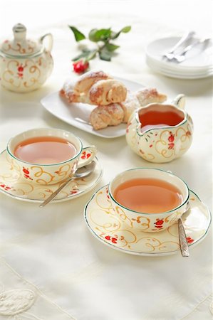 simsearch:400-03969593,k - Two cups of tea with small sweet rolls Stock Photo - Budget Royalty-Free & Subscription, Code: 400-03933519
