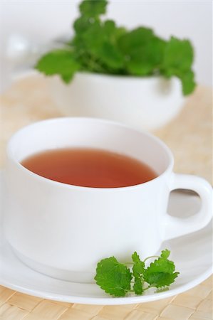 simsearch:400-06077206,k - Cup of mint tea with mint Photographie de stock - Aubaine LD & Abonnement, Code: 400-03933511
