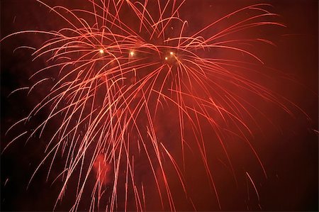 simsearch:841-06032575,k - Fireworks blowing in the sky at night Stock Photo - Budget Royalty-Free & Subscription, Code: 400-03933638