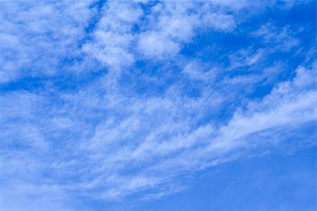 simsearch:400-03944472,k - Incredibly blue sky with fluffy clouds (shot over a mountain village in february) Stock Photo - Budget Royalty-Free & Subscription, Code: 400-03933684