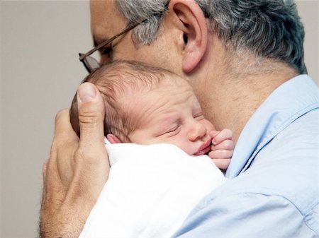 simsearch:400-07715953,k - Father and a baby on the first day in the hospital Stock Photo - Budget Royalty-Free & Subscription, Code: 400-03944061