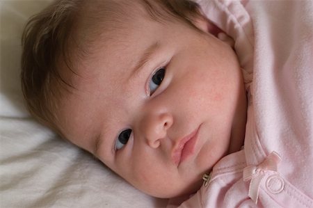 simsearch:6102-08558820,k - one month baby with a serious expression looking in the distance Stockbilder - Microstock & Abonnement, Bildnummer: 400-03944162