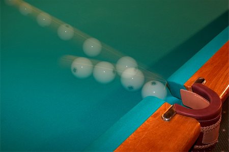 simsearch:400-04478467,k - Billiard ball flying in a billiard pocket. Stock Photo - Budget Royalty-Free & Subscription, Code: 400-03944224