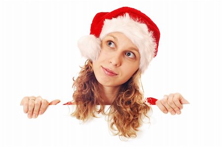 simsearch:649-06622061,k - Girl in Santa's hat with a signboard, isolated on white Foto de stock - Royalty-Free Super Valor e Assinatura, Número: 400-03944284