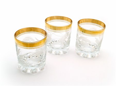 simsearch:400-03947879,k - three brandy glasses isolated on white background Stock Photo - Budget Royalty-Free & Subscription, Code: 400-03944336