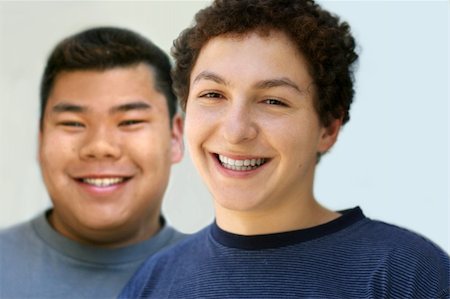 Two happy laughing college age boys Stock Photo - Budget Royalty-Free & Subscription, Code: 400-03944745