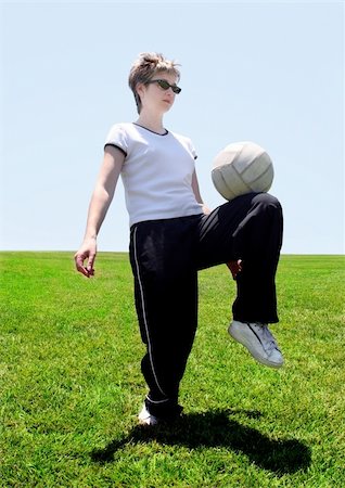 Woman on a soccer field Stock Photo - Budget Royalty-Free & Subscription, Code: 400-03944985