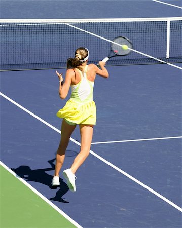 simsearch:400-08755898,k - Woman playing tennis at the professional tournament Stock Photo - Budget Royalty-Free & Subscription, Code: 400-03944997