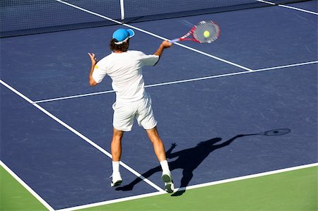 simsearch:400-08755898,k - Young man playing tennis Stock Photo - Budget Royalty-Free & Subscription, Code: 400-03944993
