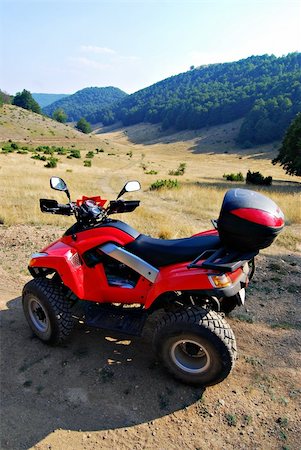 simsearch:841-03870101,k - red quad bike in nature Stock Photo - Budget Royalty-Free & Subscription, Code: 400-03945051