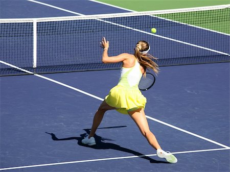simsearch:400-04067347,k - Woman playing tennis at the professional tournament Foto de stock - Super Valor sin royalties y Suscripción, Código: 400-03945227