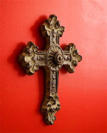 simsearch:400-03944899,k - Ornate religious cross hanging on red wall. Stock Photo - Budget Royalty-Free & Subscription, Code: 400-03945382