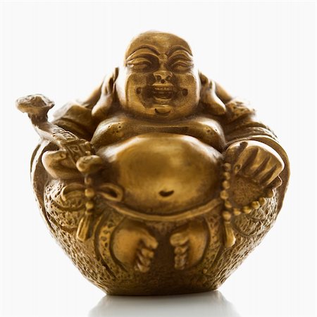 Happy laughing Buddha brass figurine on white background. Photographie de stock - Aubaine LD & Abonnement, Code: 400-03945396