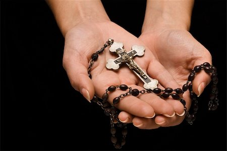 Woman's hands palm up cradling rosary with crucifix. Stock Photo - Budget Royalty-Free & Subscription, Code: 400-03945391