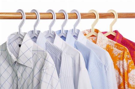 Concept of weekdays and weekend: five white-and-blue shirts and two bright-colored shirts Stock Photo - Budget Royalty-Free & Subscription, Code: 400-03945474