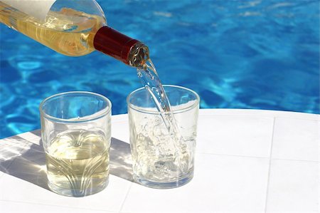 simsearch:649-08577830,k - serving 2 glasses of white wine at the swimming-pool Stock Photo - Budget Royalty-Free & Subscription, Code: 400-03945583