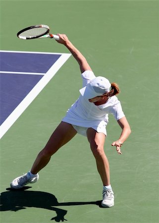 simsearch:400-08755898,k - Woman playing tennis Stock Photo - Budget Royalty-Free & Subscription, Code: 400-03945628