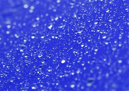 simsearch:659-06185563,k - Rain Drops on Water Resistant Textile Textile Foto de stock - Super Valor sin royalties y Suscripción, Código: 400-03945988