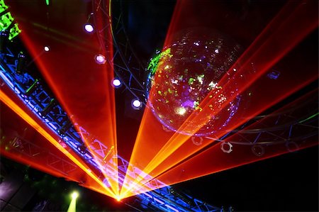 simsearch:400-03942987,k - Fantastic Orange Laser Show at the Disco Stock Photo - Budget Royalty-Free & Subscription, Code: 400-03945995