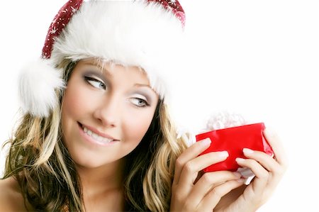 shocked face animal - winter portrait of a beautiful young smiling woman with a gift in her hands Stock Photo - Budget Royalty-Free & Subscription, Code: 400-03946160