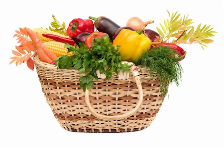 lots of fresh and ripe vegetables in the basket on white background Stock Photo - Budget Royalty-Free & Subscription, Code: 400-03946519