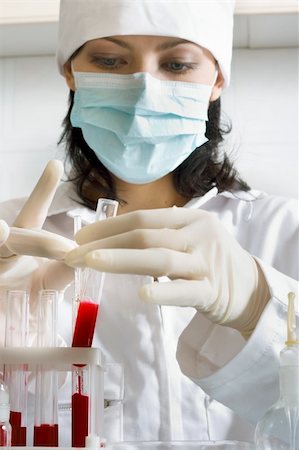 doctor making blood analysis in the laboratory Stock Photo - Budget Royalty-Free & Subscription, Code: 400-03946547